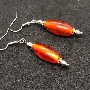 Linear orange glass bead dangle earrings